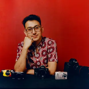 Man with camera collection Amir